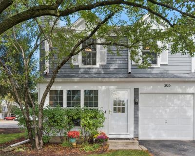 305 Cane Garden Circle, 305. Available for immediate occupancy - If you're looking for location, this home is it! This beautiful end unit is surrounded by mature trees, conveniently located, and is in School Dist 204! NEW LVP floors and NEW paint throughout main level! The large living room offers an inviting space to unwind as you cozy up to the fireplace and enjoy amazing natural light throug...