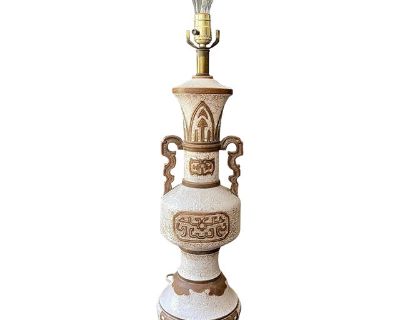 Stunning lamp, Made in Italy, this lamp is made of a terracotta clay. Glazed white over a Greek key design that is incised into the clay over the entire body of the lamp. Both sides of lamp are decorated the same, with a central panel of Asian motif. Large scrolling handles in a brown sculpt and arch on each side, Greek key pattern repeats in the handles. Wonderful lamp to mix into a modern dec...