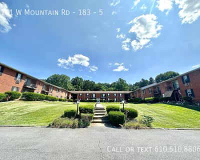 101 W Mountain Rd. Professionally managed updated centrally located 2 Bedroom 2 Full Bath apartment in quiet residential location. Apartment has built in air conditioners and electric baseboard heat as well as electric hot water and cooking. Enjoy a balcony overlooking a quiet neighborhood surrounded by lots of greenery. Bedroom features a walk in closet. Laundry facilities on site, private par...