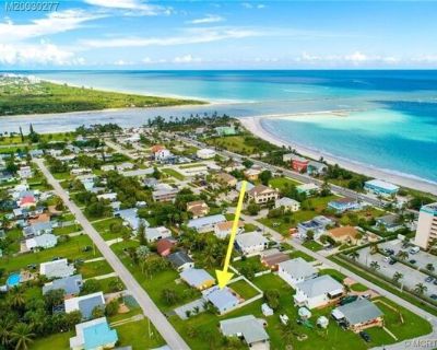 356 Granada St. AVILABLE THE MONTH OF DEC 2025 ONLY! HIDDEN GEM Beach Home on Hutchinson Island. FULLY FURNISHED. Pet Friendly! Walk two blocks, and your toes are in the sand. This home is head-to-toe remodeled with a large master suite and 2 additional bedrooms, split floor plan. Porcelain tile throughout. Kitchen has lots of storage and bar top seating. Impact Windows with black out shades. F...