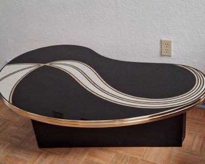 Uniquely shaped Coffee table $395