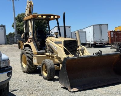 1993 John Deere 310D Backhoe Loader
