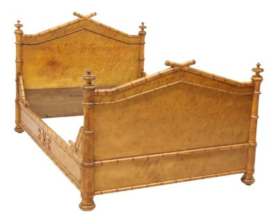 Late 19th century Maison Krieger French Bird's Eye Maple Bed with Faux Bamboo Moldings. Bed features matching headboard and footboard, each with a triangular pediment toped by crossed bamboo finials and turned corner posts. The design rests on bun feet. Stamped "Maison Krieger" on the interior footboard, confirming its authenticity and fine Parisian craftsmanship. Maison Krieger was one of the ...