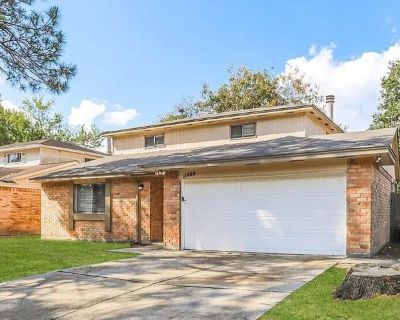 This home Features an attached garage and a fenced-in yard with a concrete back patio, this two-story property boasts an open layout with a gorgeous red brick fireplace in the living room. Several big windows flood this space with ample natural light, and a back door leads outside. Schedule a tour today (832)440-9088