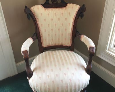 Antique chair matches love seat
