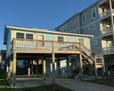 806 Canal Dr Lot 1311. Excellent location on Canal close to beach access. Small cottage with Pine paneling on pilings on Duplex lot. Great opportunity for an individual seeking cute 3 bedroom cottage with one bath. This unit has updated appliances and newly remodeled bathroom as well as LVP flooring, front and back covered porches and large backyard. Must view property before you apply. **Discl...