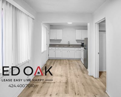 Spacious, Bright &amp; Sunny Remodeled One Bedroom With Kitchen Appliances, TONS of Natural Light, Gas Furnace, Plenty of Storage Space, and Water Included! In Prime South Los Angeles!