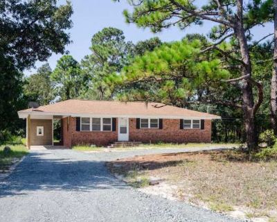 3 Bedroom 1.5BA 1215 ft Pet-Friendly Apartment For Rent in Myrtle Grove, NC