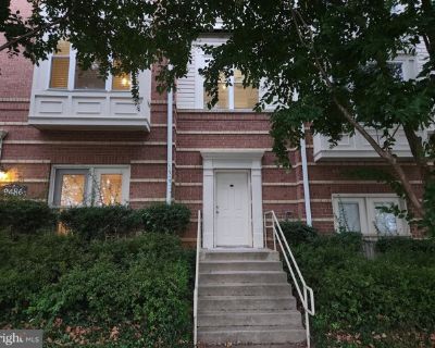 9486 Virginia Center Blvd Unit 114. Beautifully maintained and sun-filled two-level condominium offering 2 bedrooms, 2 full baths, and two assigned garage parking spaces. This bright, open layout combines the comfort of condo living with the feel of a townhome, featuring spacious interiors framed by mature trees that create a sense of privacy and tranquility just steps from the Vienna/Fairfax M...