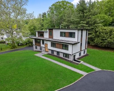 148 Great Hills Rd. Modern Luxury Redefined - A Masterpiece of Design Detail. Welcome to a one-of-a-kind architectural gem where every element speaks of thoughtful design, cutting-edge features, and timeless luxury. Step inside through a stunning custom Mahogany and White Oak door into a dramatic foyer with natural black stone tile, custom glass walls, and designer lighting.The soaring 18' grea...