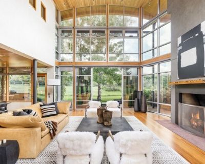 700 Nell Erickson Rd. Exquisite Red Mountain Residence: A Fusion of Nature and Luxury, Furnished with RH. The Red Mountain Residence, a magnificent 7-bedroom, 6-bathroom property set on 12 acres, offers the epitome of luxury living. Adorned with exquisite RH furniture, the residence showcases a blend of contemporary design and natural beauty. Its elongated structure is thoughtfully positioned t...