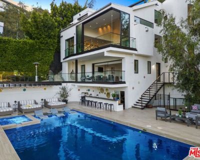 8514 Franklin Ave. This property is available for short-term and long-term rentals, each with its respective pricing options. It is fully furnished, decorated, and equipped with hotel-like essentials and amenities. With our concierge team available to assist 24/7, this home rental offers a five-star hospitality experience, whether you are staying for a few days, a month, or a year.Located right...