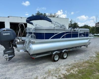 Introducing the 2024 Bennington 22SVSR Tritoon, powered by a Yamaha 150 engine. This stunning boat features a sleek Monaco Blue panel color, complemented by a Monaco Blue canvas and stylish silver Simtex upholstery. It boasts Seagrass flooring for comfort and durability, along with a Striker 4 graph for navigation. The interior accents are elegantly finished in Monaco Blue, and it comes equippe...
