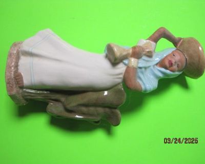 1944 McCarty Bros. porcelain figurine.......signed.