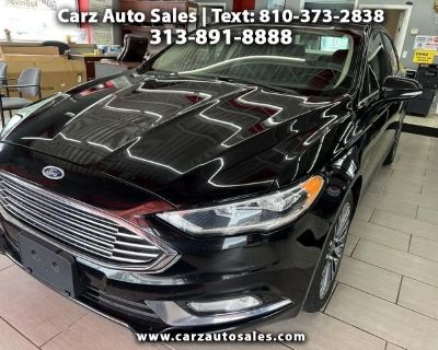 Get ready to hit the road in style with this sleek Black 2017 Ford Fusion! This beauty is more than just a pretty face - with a powerful 2.0L EcoBoost engine under the hood, you'll experience a smooth and exhilarating drive every time you step on the gas. Whether you're cruising through the city streets or taking on the open highway, the Automatic Full-Time All-Wheel drive system will keep you ...