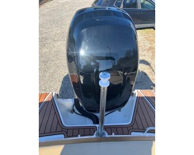 Introducing the 2018 Sea Ray 210 SP0, equipped with a powerful Mercury 200 HP engine that has only 146 hours of use. Enjoy peace of mind with a warranty valid until late summer 2026. This boat features an upgraded interior and stereo package, along with a ski pylon for all your water sports needs. It comes with a tandem axle aluminum trailer for easy transportation and boasts a Sea Dek on the s...