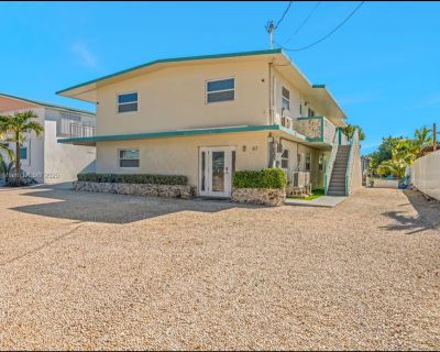 Coral Dr. Beautiful Updated WATERFRONT 2/1 Apartment remodeled with attention to detail Unfurnished and ready for your decor and furniture ALL UTILITIES ARE INCLUDED Additionally, there is a EV charging station available on premises that can used for an additional $25 a month!! That's a steal! This property sits on a canal that leads out to the open waters of the Florida keys and it's located w...