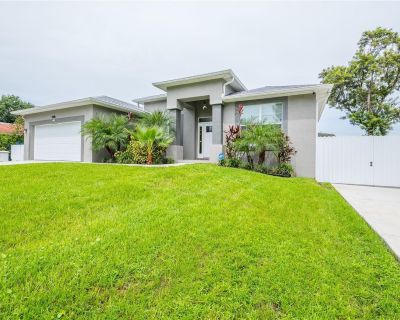 Little River Drive. Public Remarks:Absolutely Stunning Newer Construction home. Boasting 4 Bedrooms and absolutely Loaded with upgrades. Sitting on over a quarter Acre Lot. No CDD fees, No HOA Fees. Hurricane Impact Windows and Doors, Porcelain Tile throughout, Solid Custom Wood Cabinets with soft close drawers, with countertops enrobed in Granite, all stainless appliances, Custom Ceiling Fans,...