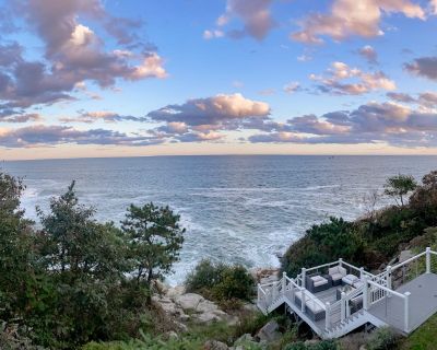 Avg / night: $1,107. Modern oceanfront home with scenic deck, grill, games, chef's kitchen, & W/D | Located in Gloucester, MA | 4.71 Stars | 3 Bed, 3 Bath | No Pets. No pets. Max 6 guests. Magnificent sunrise views await at this oceanfront charmer! Modernly updated and full of light, the interior of Magnolia Tides displays an open-concept layout, separate living quarters in the basement, and oc...