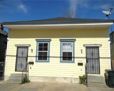 2221 St Philip St. Recently RENOVATED, CENTRALLY LOCATED, PET FRIENDLY apartment in Treme' near Esplanade Avenue and the Lafitte Greenway! SPACIOUS with 3 independent bedrooms and 2 full baths. (Primary suite is at rear.) Kitchen is complete with granite counters, ample cabinet storage, refrigerator, range/oven and dishwasher. There are washer and dryer hookups, central heating and air, and a l...
