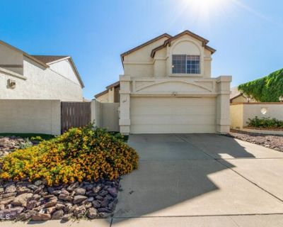 501 E Topeka Dr. This delightful 2-story rental is ready to welcome you home! From its charming courtyard and 2-car garage to its inviting interior, you'll find plenty to love. Soaring vaulted ceilings, tile floors, and a cozy fireplace set the scene for relaxed living. Host dinner parties in the formal dining area or whip up your favorites in the stylish kitchen featuring wood cabinetry, mosai...