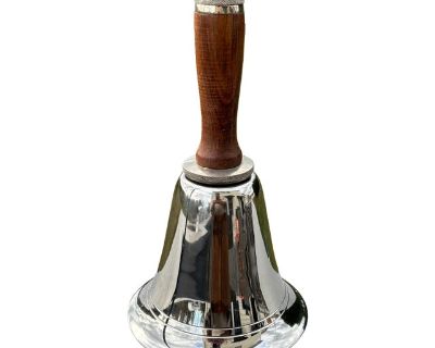 Gives "Let's Ring a Bell" a whole new meaning! This is a beautifully crafted mid-century novelty - a decanter in disguise as a bell - and it rings! Bright silver chrome finished "bell" is topped with a hardwood handle - secured by steel screw caps. Heavy, properly built, tight as a drum. 10.5" to the top of the handle, 6" wide at the bottom. When empty it rings with a charming tone, and we have...