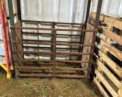 An alleyway for working Sheep and a head gate getting out of the Sheep business