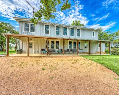 Avg / night: $654. Historic but Completely Updated and Dog-Friendly Farmhouse - Close to Wineries | Located in Fredericksburg, TX | 4.71 Stars | 4 Bed, 3.5 Bath | Pet-friendly. Dog-friendly. Max 10 guests. Become part of the rich history of this four-bedroom Fredericksburg farmhouse, a spacious, century-old home with front and back porches for gatherings of family and friends in the heart of th...