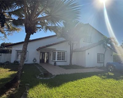 SW 138th Pl. four bedroom 2 baths upstairs. One bedroom on the main floor plus a seperate 1/1 in the converted garage with separate entrance and privacy for multi generational living. Fenced back yard with pool. Great for a large family.. 5 Bedroom. 4 Bathroom. 2459 ft