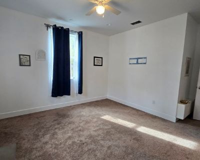 Beautiful master bedroom featuring an attached bathroom and a spacious walk-in closet. Located near Pinole Middle School, this modern home offers comfort and convenience with parks and shopping centers just minutes away perfect for easy, everyday living.. 1 Bedroom. 1 Bathroom