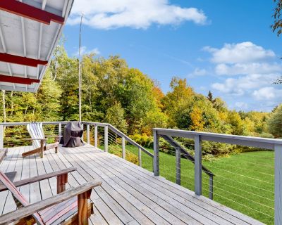 Avg / night: $564. Picturesque, Euro-style ski chalet with beautiful setting, deck & fireplace | Located in Peru, VT | 4 Bed, 2 Bath | No Pets. No pets. Max 8 guests. From the floor-to-ceiling windows to the distant view of Stratton Mountain across the treetops, this Peru home is the quintessential Vermont getaway. Between the classic, ski-inspired decor, the crackling fireplace, and the wondro...