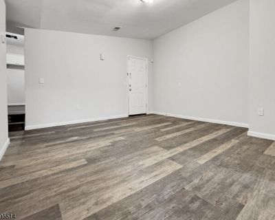 511 S Main St Unit 2. Modern elements are found throughout this incredible second floor apartment that offers great space with amazing finishes. This two bedroomapartment has a beautiful kitchen that offers white shaker cabinetry that is combined with stainless steel appliances and white countertops with coordinatingwhite subway tile backsplash. Stackable laundry is within the apartment! This i...