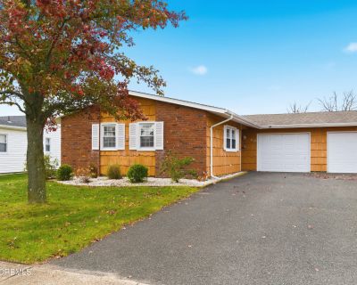 52 Darley Circle. Beautifully renovated, 55+, dogwood model conveniently situated across from clubhouse and pools. Updated bath and kitchen, new floors and freshly painted with neutral colors. Attached 1 car garage. Electric fireplace stays and heats up quickly.. 2 Bedroom. 1 Bathroom. 1076 ft