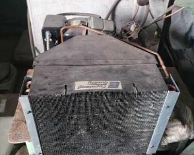 Compressor and condenser for a walk in cooler. But on an action and never used. Al