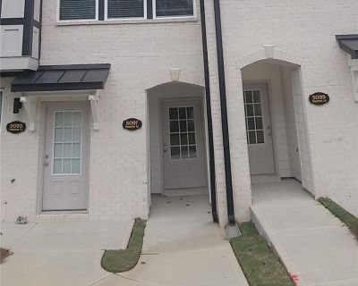 3 Bedroom 2BA 1896 ft Condo For Sale in Peachtree Corners, GA