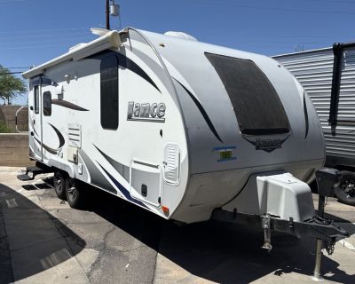 Experience the open road with the 2018 Lance 1995 Lance Travel Trailer. This used travel trailer is perfect for weekend getaways or extended adventures. Enjoy the freedom of exploring national parks or relaxing at your favorite campsite. This coach offers a compact 24 ft length, making it easy to maneuver. While it has no slideouts, the design maximizes living space efficiently. With a GVWR of ...