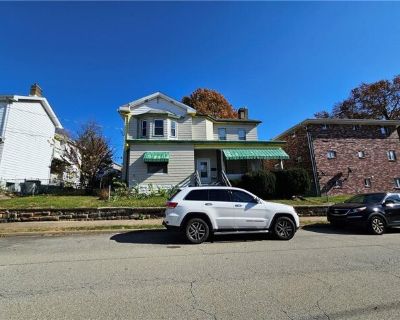 629R Walnut St. Step into this beautifully updated 2-bedroom, 1-bath duplex that perfectly blends old-world charm with modern convenience. The spacious living room features a decorative fireplace and plenty of natural light, while the large dining room offers the perfect setting for gatherings and everyday meals. Enjoy cooking in the updated kitchen, complete with newer cabinetry and all applia...