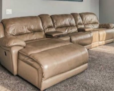 Cindy Crowfoot leather sectional. 7 pieces (4 seats and 3 consoles )