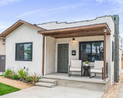 745 W 106th St. Stop scrolling! Rare Find: Designer 2 Bed, 1 Bath Luxury Front Home GEM! This GORGEOUS 804 sq ft standalone residence is a total reimagining, offering the privacy of a stand alone house in a highly sought-after neighborhood.. The kitchen is a masterpiece: custom white oak and maple cabinetry, quartzite waterfall countertops, and a seamless open-concept design. Enjoy high-end fin...