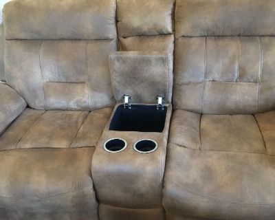 Reclining love seat with cup holders and counsil