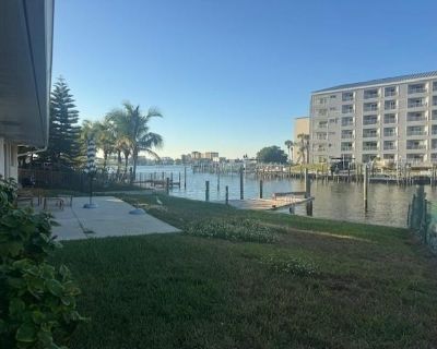 216 Palm Is NW. A wonderful 2 bedroom 2 bath home on Island Estates ready for occupancy starting Dec 1, 2025. Remodeled the summer of 2025, home features new quartz tops in the kitchen, and in both bathrooms. New appliances and backsplash throughout kitchen. Enjoy sunsets and dolphins from your back porch. This home is a must see.. 2 Bedroom. 2 Bathroom. 1608 ft