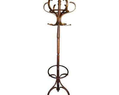 This vintage bentwood coat and hat rack is a timeless classic, inspired by traditional European hall tree designs. It's central structure crafted from solid wood with elegant curves, warm walnut-toned finish and detailed with brass toned fasteners, it features double-tier hooks for coats and hats, and a lower circular ring ideal for umbrellas or walking sticks. The sculptural form and functiona...