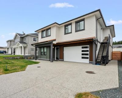 Modern Family Home W/ Legal Suite!