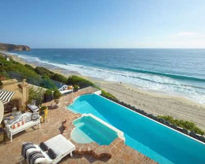 18 Breakers Isle. This European-inspired oceanfront home by interior designer Sue McKeehan and Architect Marshall Ininns is in the 24-hour guard gated beachfront community of Niguel Shores in Monarch Beach. Infused with antique details and the finest finish materials, the old world feeling is evident everywhere in the home, starting in the entry courtyard with its black and white marble floor, ...