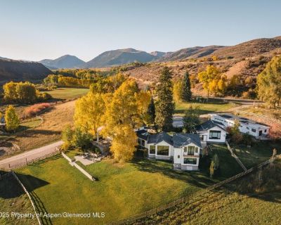 1814 Woody Creek Rd. Set on more than 43 private acres along the banks of Woody Creek, this remarkable property captures the essence of authentic Aspen ranch living-blending rich history with refined luxury. The estate includes a main residence with 5 bedrooms, multiple gathering areas, fireplaces, and rustic yet sophisticated detailing throughout. Large picture windows frame open pastures, mat...