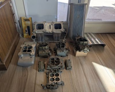 Selling as a total package. Edelbrock polished SBC tunnel ram, Weiand #1932 tunnel ram single carb top, Offenhauser polished aluminum hood scoop, Mr Gasket dual quad air cleaner, 2-Holley 660 Center squirter carbs plus miscellaneous parts, 1 - Holley list #4346 780 CFM GM carb. It's missing the vacuum canister for the secondaries but I have all of the choke assembly plus the choke pull less 2 s...