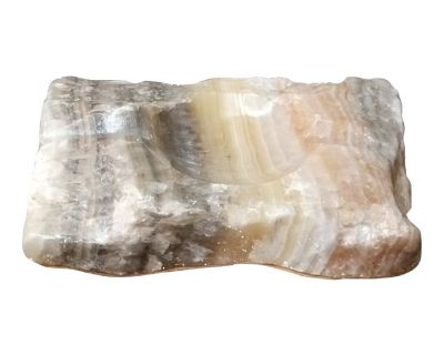 GORGEOUS Genuine Variegated Onyx 4"x6" Slab Single Votive Holder Elevate your home's ambiance with this exquisite single votive holder, crafted from the genuine variegated onyx, a stone renowned for its aesthetic appeal and durability. The 4"x6" slab provides a sturdy base for tea lights, casting a warm and inviting glow that complements any decor. This free-standing candle holder offers a blen...