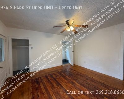 934 S Park St Uppr UNIT. 934 S Park St Upper Unit is a large 3 bedroom apartment located near Burr Oak and S. Park St. This unit has two entrances - one in the front on the porch and one in the rear near the parking area. This unit has a large kitchen with fridge, range and oven included. A full bathroom with a freshly refinished tub/shower is around the corner from the kitchen. Down the hall a...
