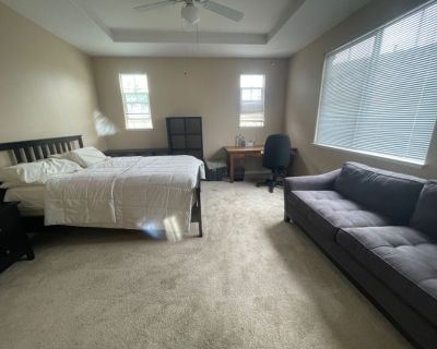 Cheerful Spacious Upper level Master Suite with off street parking.