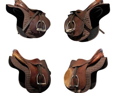 Set of Four Vintage American Jump Saddles on Racks